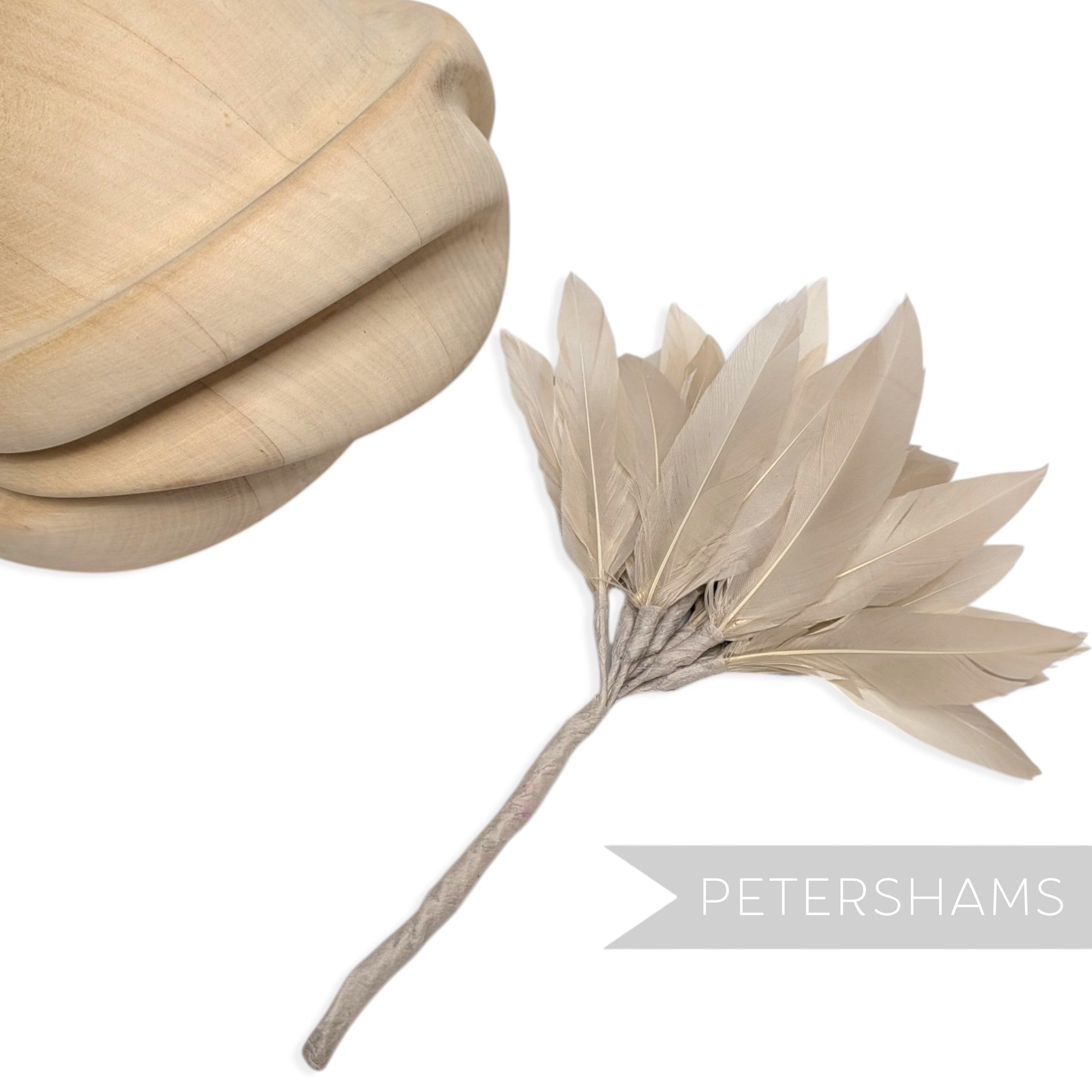 Petershams Millinery Supplies Kay goose feather pom flower mount for hat making in a neutral beige tone.