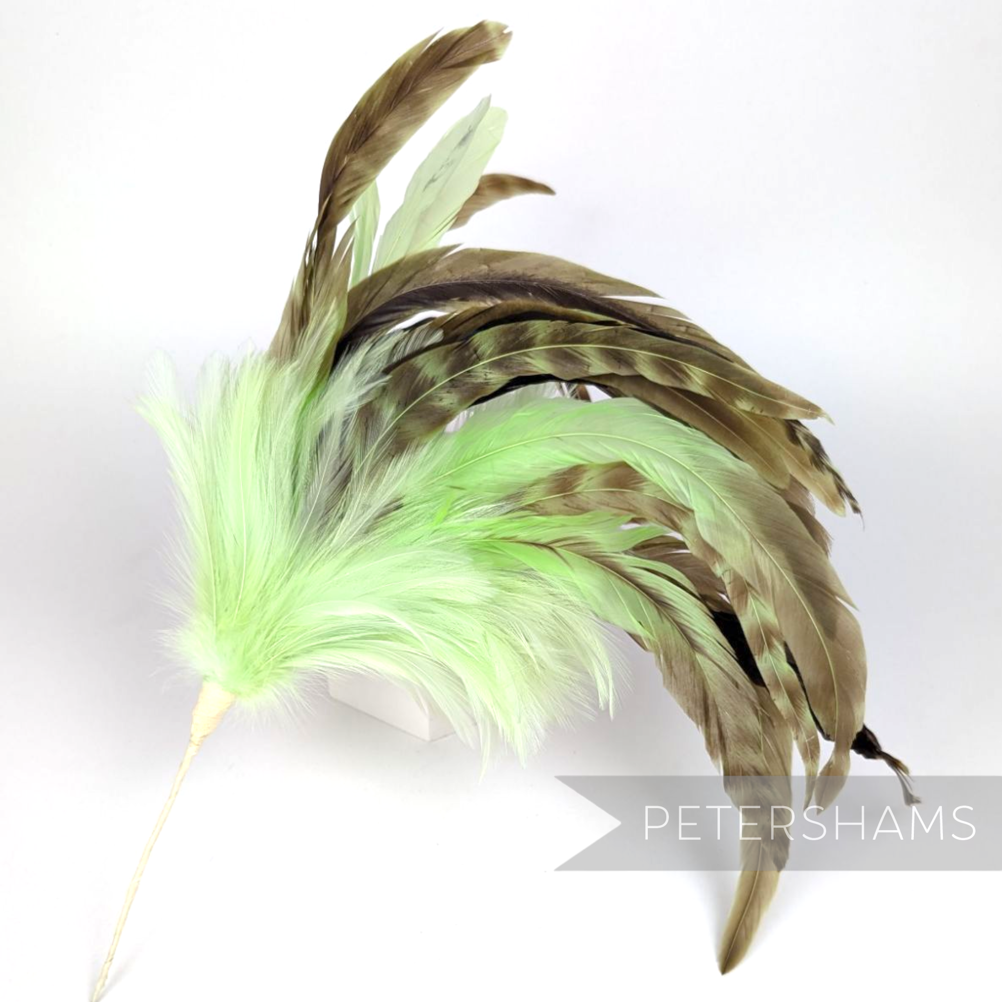 Petershams Millinery Supplies extra large feather hat mount with green hackle and chinchilla pattern coque feathers