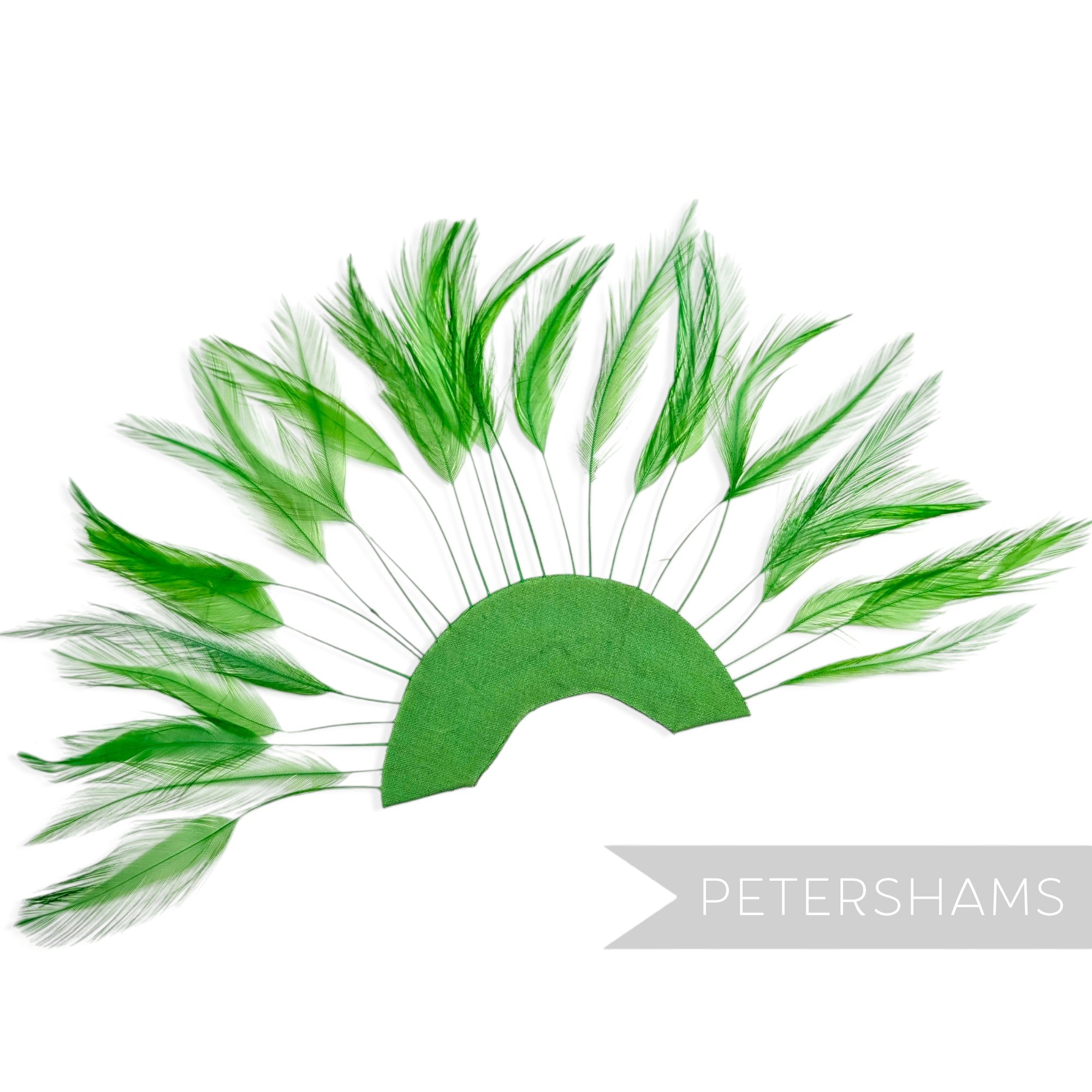 Petershams Millinery Supplies emerald green stripped hackle feather fan on a cotton base for hat and fascinator trimming.