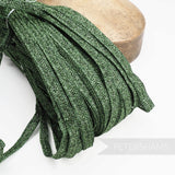 Petershams Millinery Supplies 10mm green metallic lurex hat braid with a raised zig-zag texture in a full 80m hank.