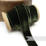 Petershams Millinery Supplies 23mm dark green elastic stretch velvet ribbon on a wooden spool