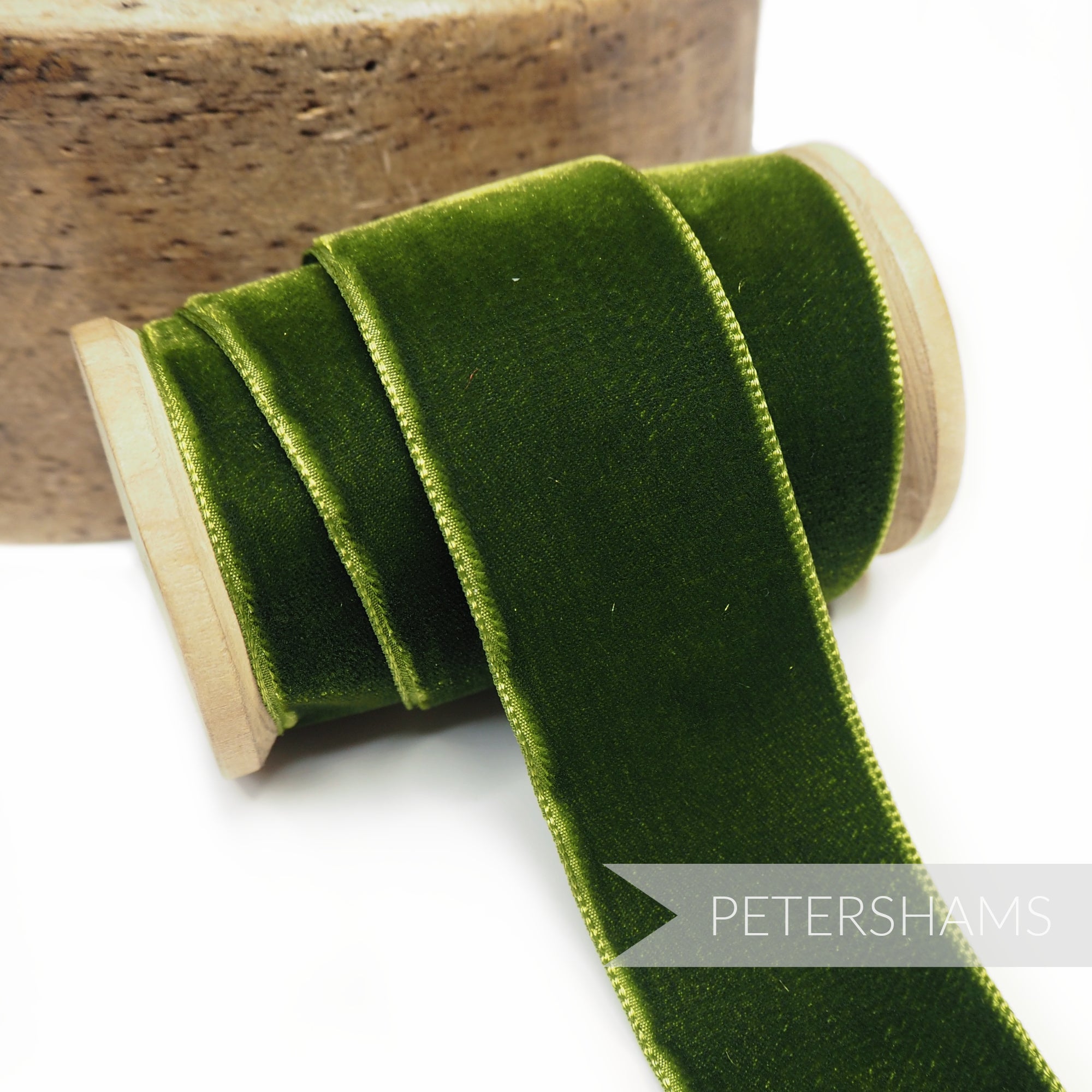 Petershams Millinery Supplies 36mm wide cactus green French velvet ribbon on a wooden spool