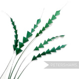 Petershams Millinery Supplies green hand-stripped coque feathers with a decorative zig zag trim for hat making