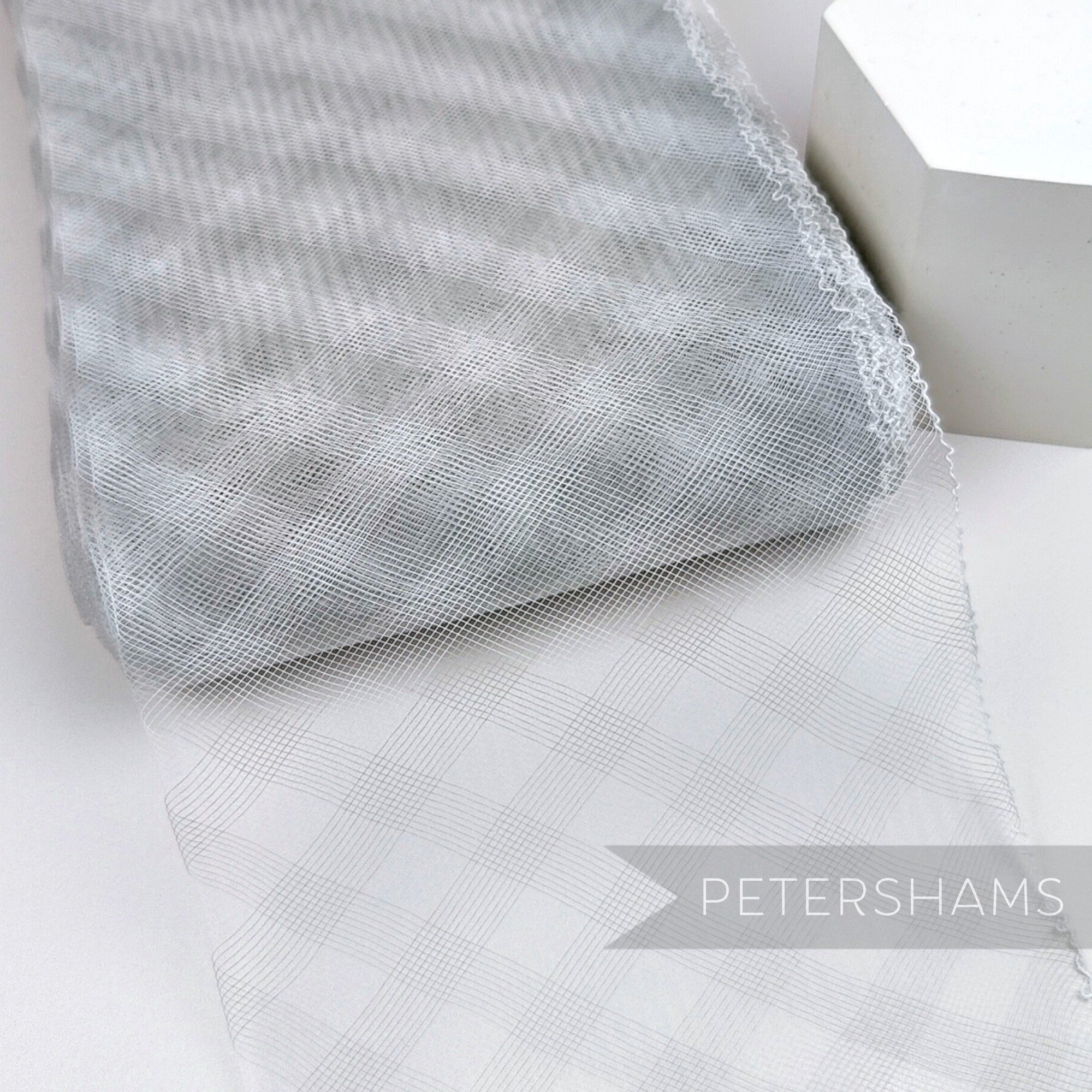 Petershams Millinery Supplies 15cm wide pale grey crinoline with a subtle checker pattern for fascinator making