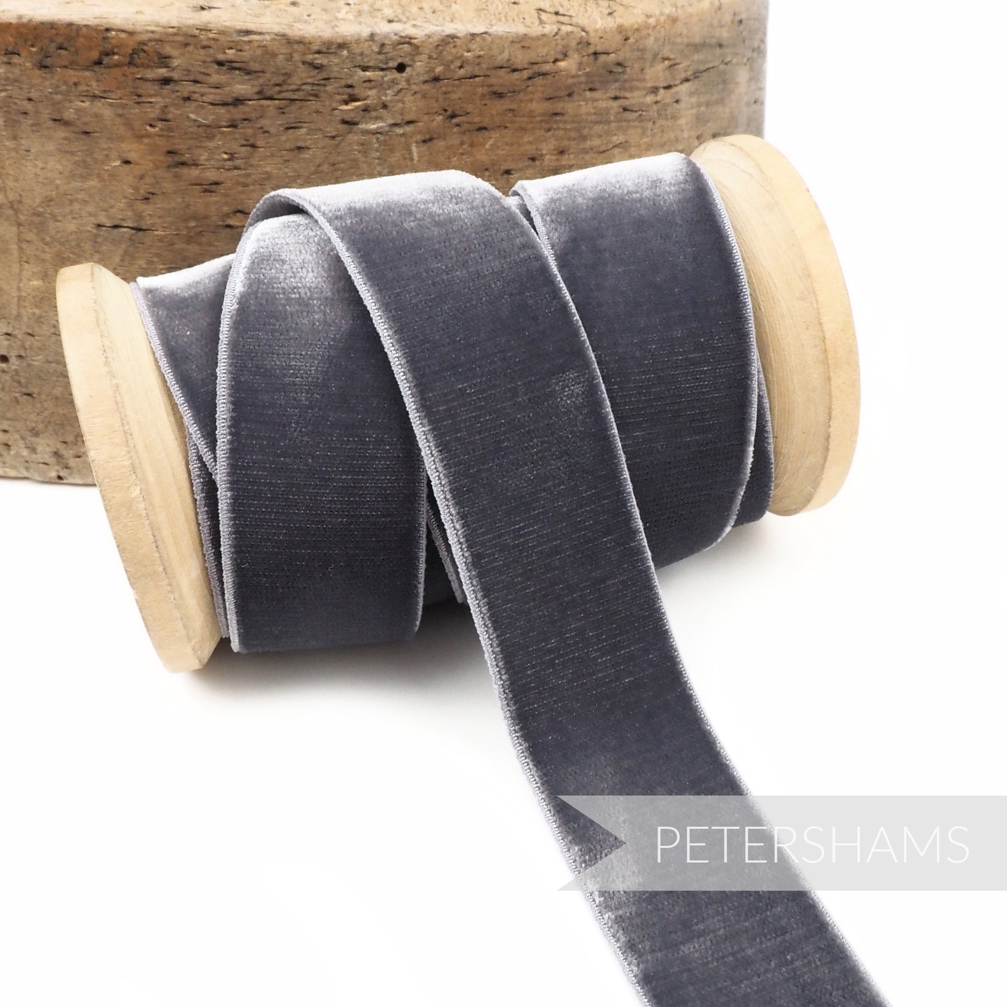 Petershams Millinery Supplies 23mm grey elastic stretch velvet ribbon on a wooden spool for millinery projects