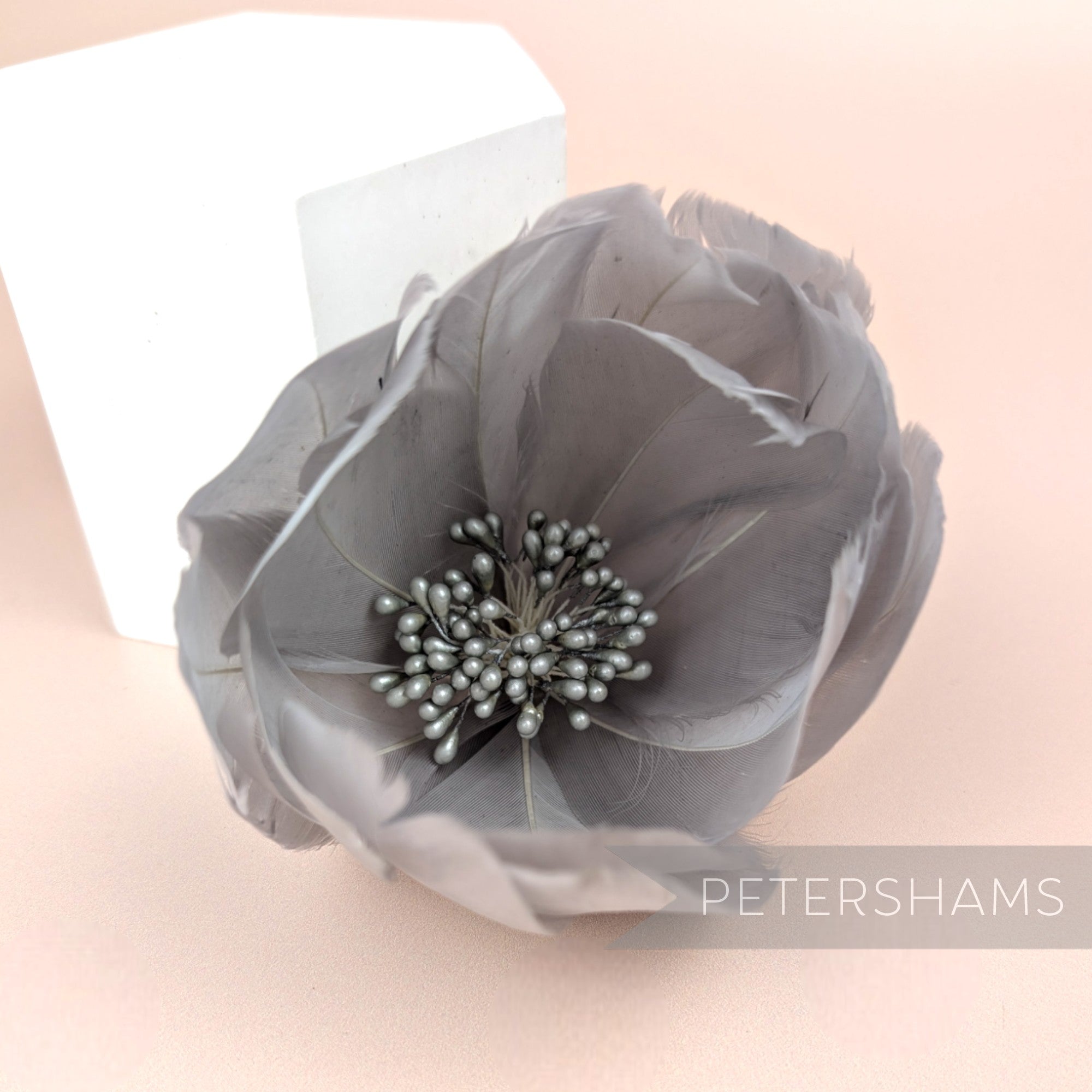 Petershams Millinery Supplies large grey tulip-shaped feather flower with a detailed stamen center