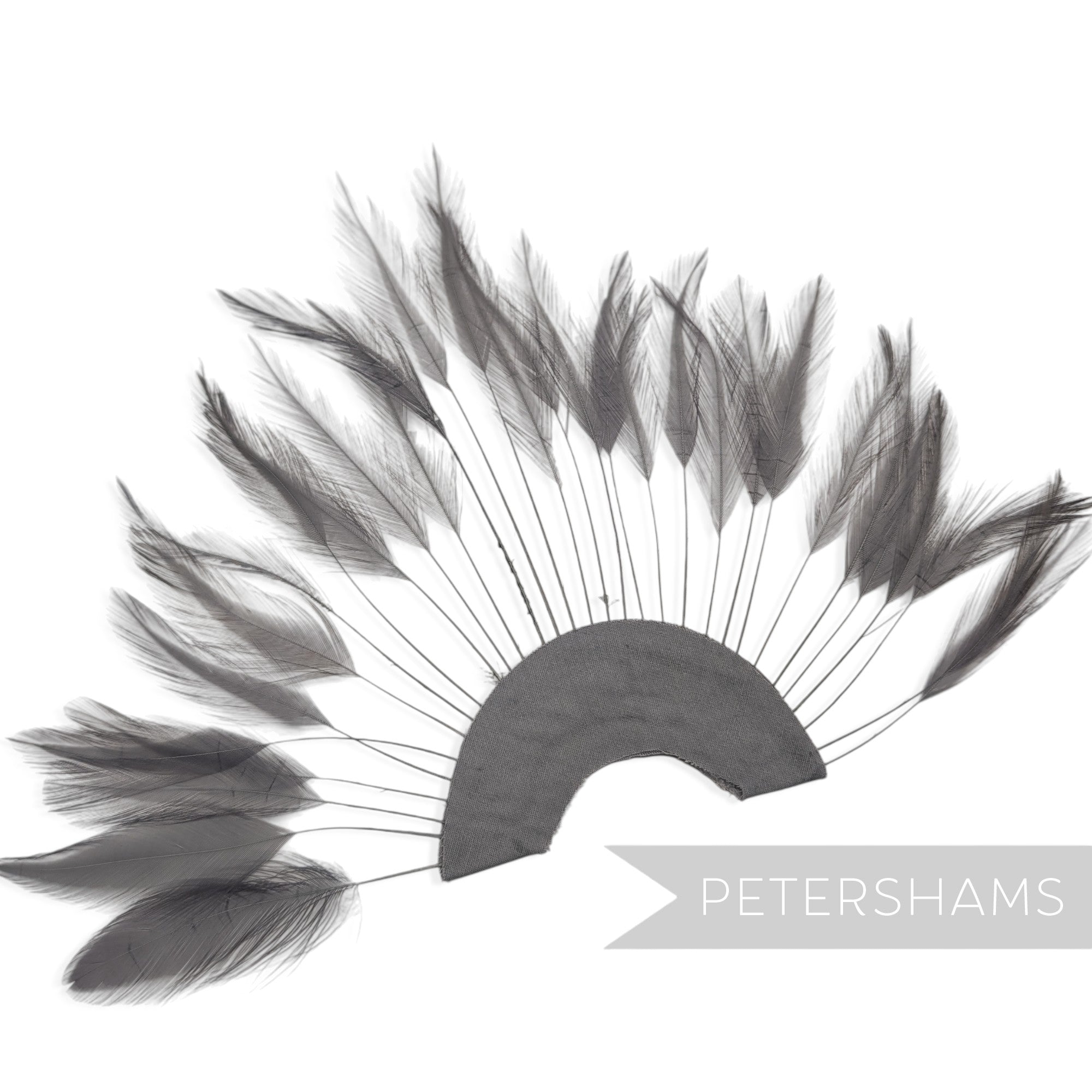 Petershams Millinery Supplies dark grey stripped hackle feather fan on a cotton base for hat and fascinator trimming.