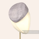 Petershams Millinery Supplies Betty sloped grey sinamay pillbox fascinator hat base on a millinery mannequin head