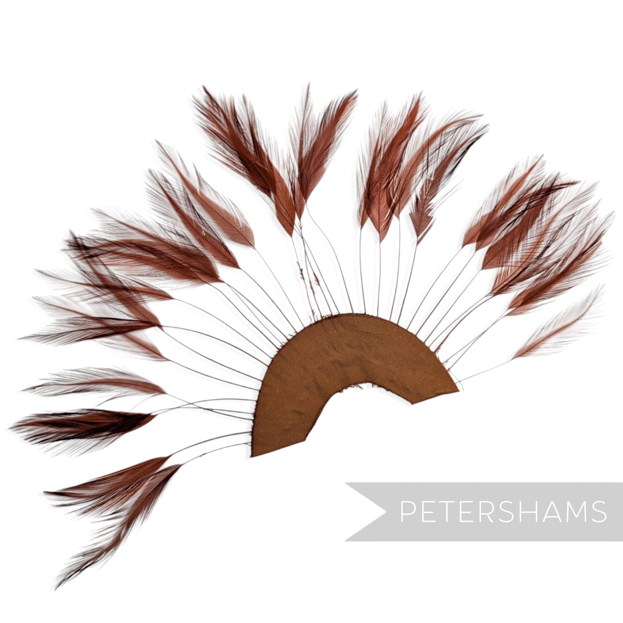 Petershams Millinery Supplies rust stripped hackle feather fan on a cotton base for hat and fascinator trimming