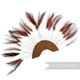 Petershams Millinery Supplies rust stripped hackle feather fan on a cotton base for hat and fascinator trimming