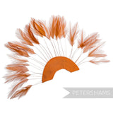 Petershams Millinery Supplies burnt orange stripped hackle feather fan on a cotton base for hat and fascinator trimming