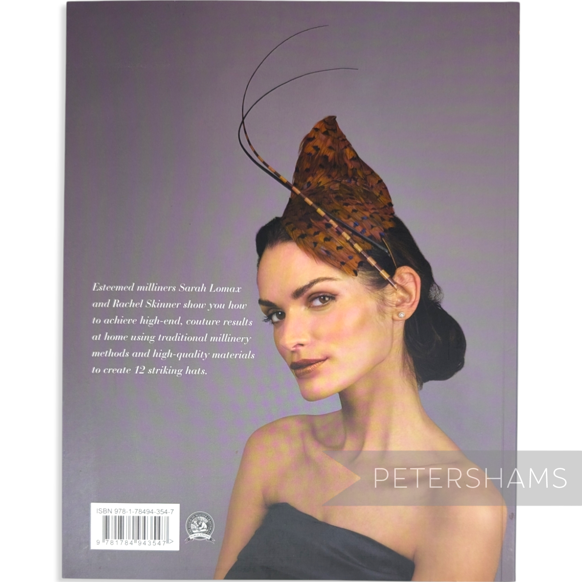 Back cover of Petershams Millinery Supplies book featuring a model wearing a feathered fascinator hat