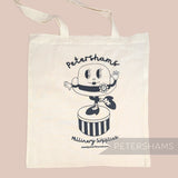 Petershams Millinery Supplies Hattie printed cotton shoulder tote bag in natural cream with black mascot illustration