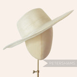 Petershams Millinery Supplies ivory cotton threaded capeline hat body with a shiny polybraid edge