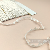 Petershams Millinery Supplies vintage 10mm ivory cotton guipure lace trim with a delicate club and scallop design.