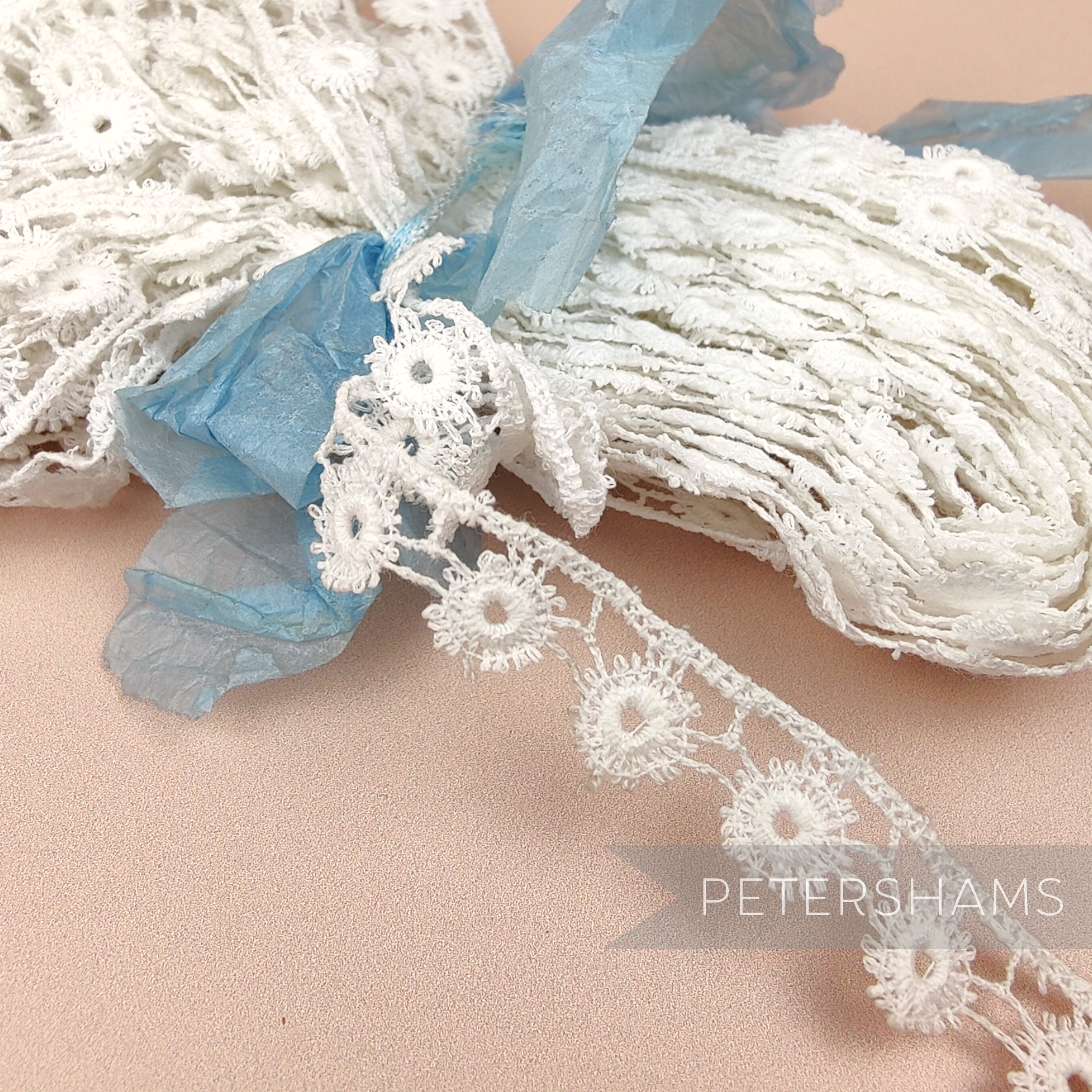 Petershams Millinery Supplies vintage 1950s ivory cotton guipure lace trim with delicate sunflower floral pattern