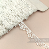 Petershams Millinery Supplies vintage 15mm ivory cotton guipure lace trim with a triple circle scalloped edge design.