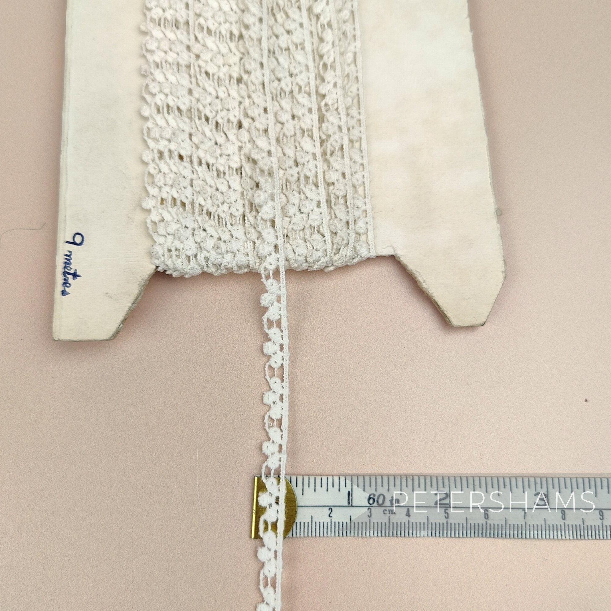 Petershams Millinery Supplies vintage 8mm ivory cotton guipure lace trim with club and swag pattern on a spool