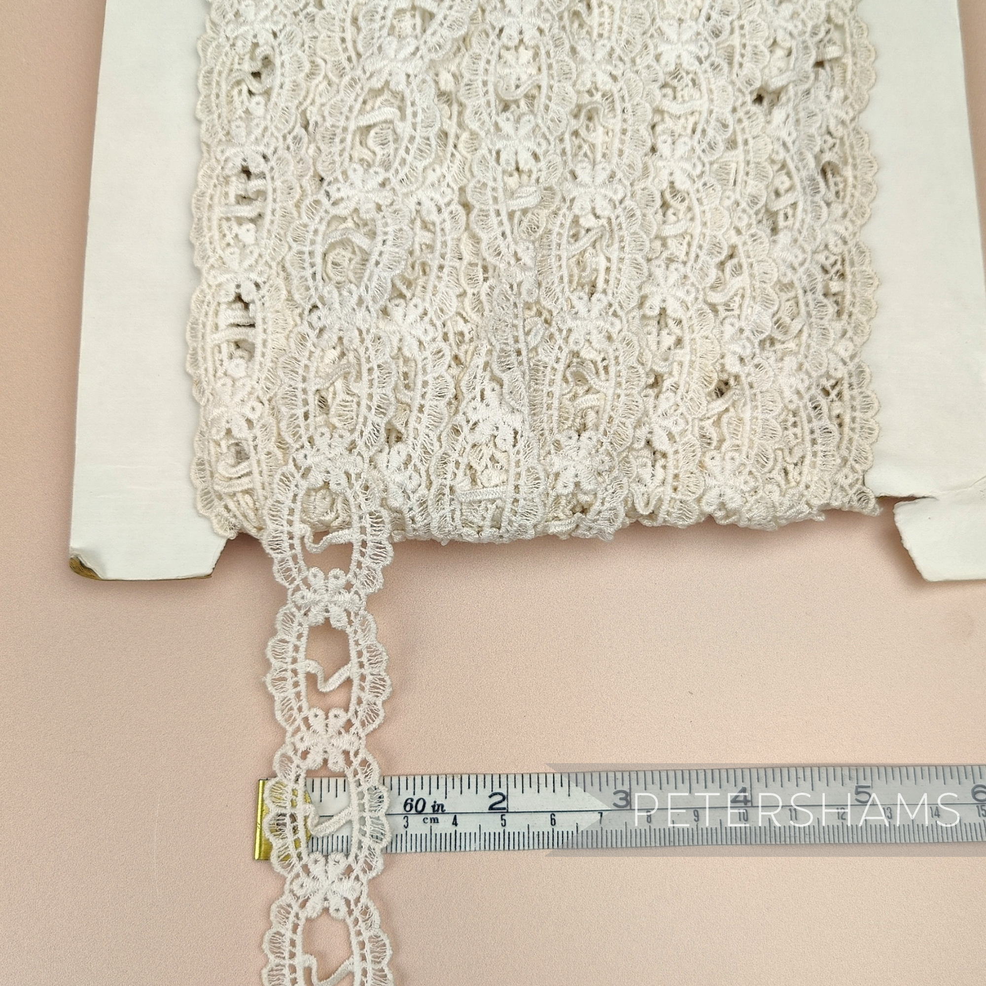 Petershams Millinery Supplies vintage ivory cotton guipure ribbon slot lace trim with scalloped frame design.