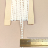 Petershams Millinery Supplies vintage 7mm ivory cotton ribbon slot lace on a card with a brass ruler for scale