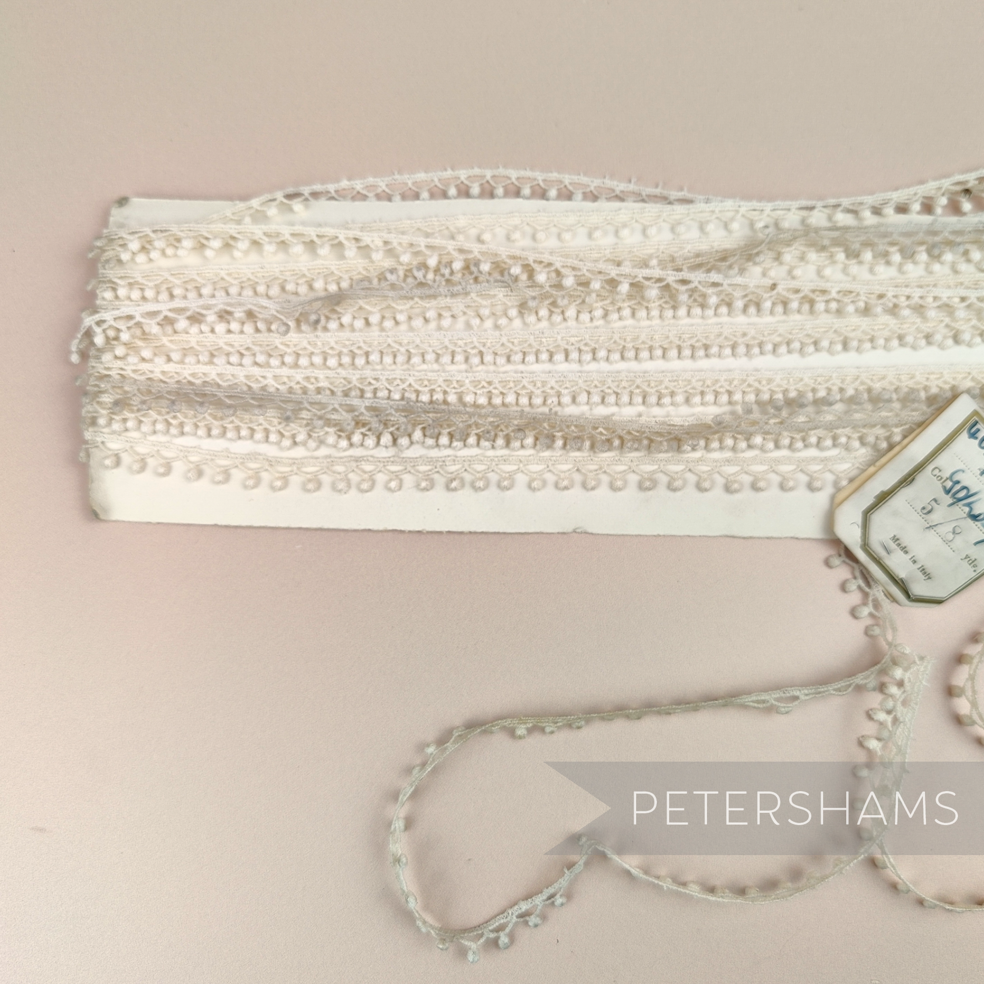 Petershams Millinery Supplies 8mm ivory dotted drop lace trim on a card, vintage Italian sewing material.