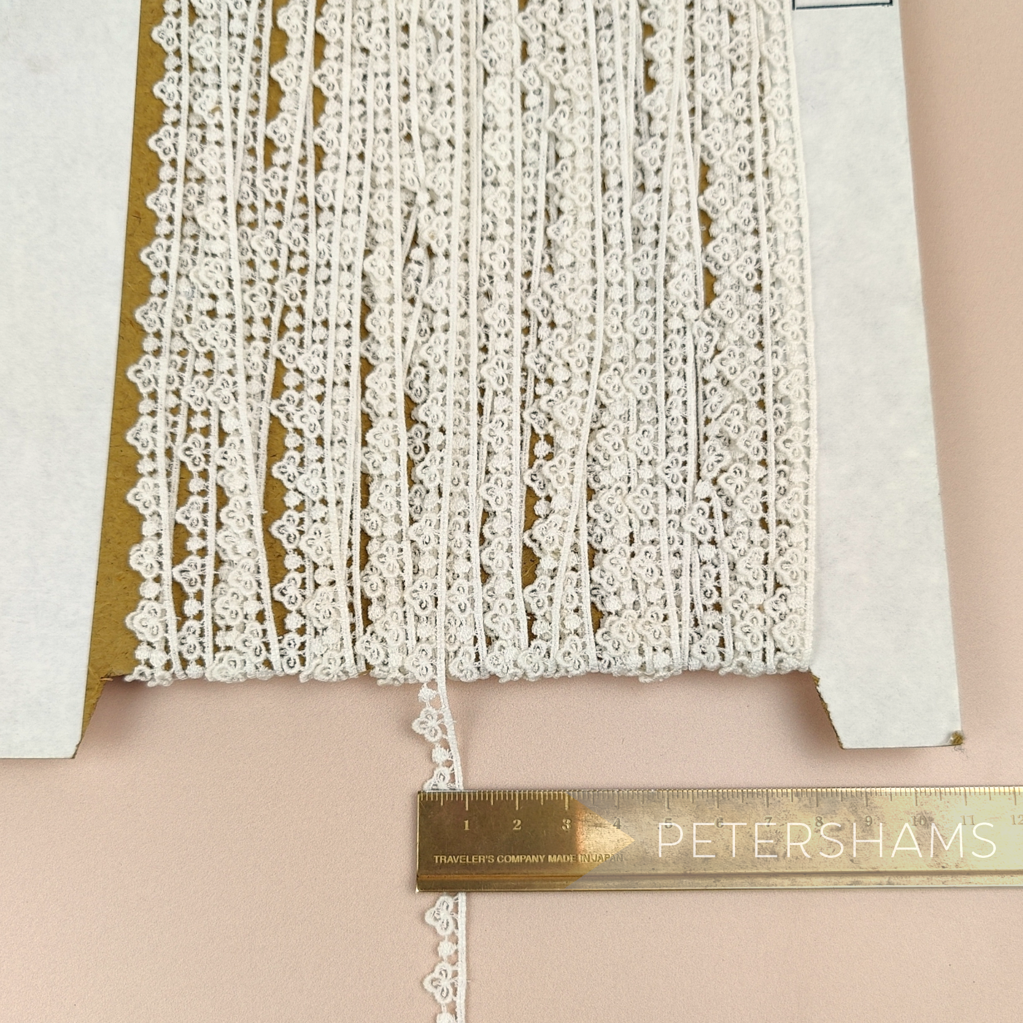 Petershams Millinery Supplies vintage 9mm ivory guipure lace trim with mini club dotted design on a cardboard spool