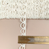 Petershams Millinery Supplies vintage 16mm ivory guipure lace trim with a delicate double swag pattern.