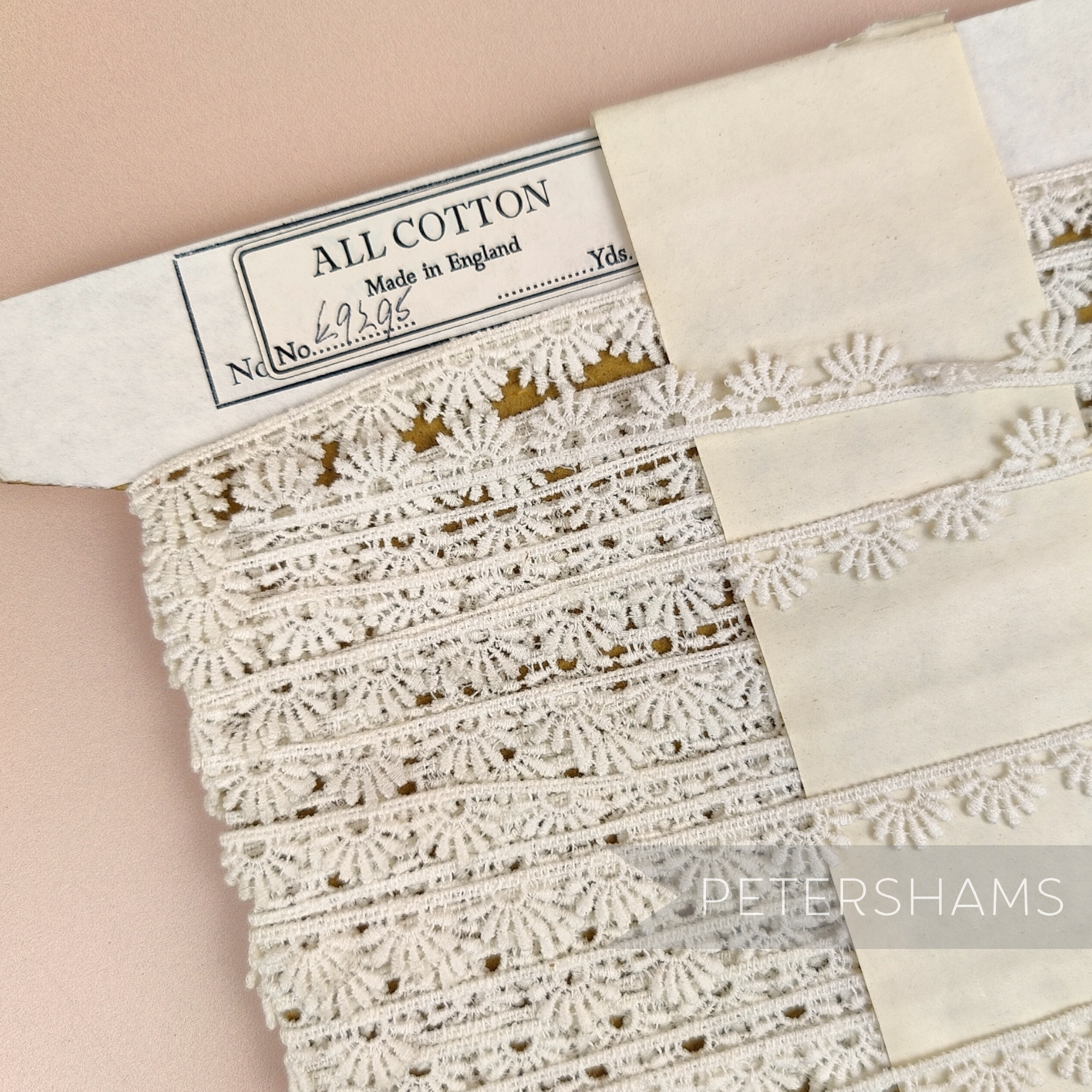 Petershams Millinery Supplies vintage 10mm ivory guipure lace trim with a radiant fan pattern on a paper spool