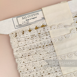 Petershams Millinery Supplies vintage 10mm ivory guipure lace trim with a radiant fan pattern on a paper spool