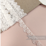 Petershams Millinery Supplies vintage 12mm ivory guipure lace trim with a delicate eyelash wheel pattern