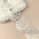 Petershams Millinery Supplies 6cm ivory guipure lace trim with a vintage-style filigree pattern and raised texture.