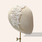 Petershams Millinery Supplies ivory lace collar motif with iridescent sequins and faux pearls on a millinery head form
