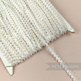 Petershams Millinery Supplies vintage ivory 5mm looped edge trim on a card for sewing and millinery projects
