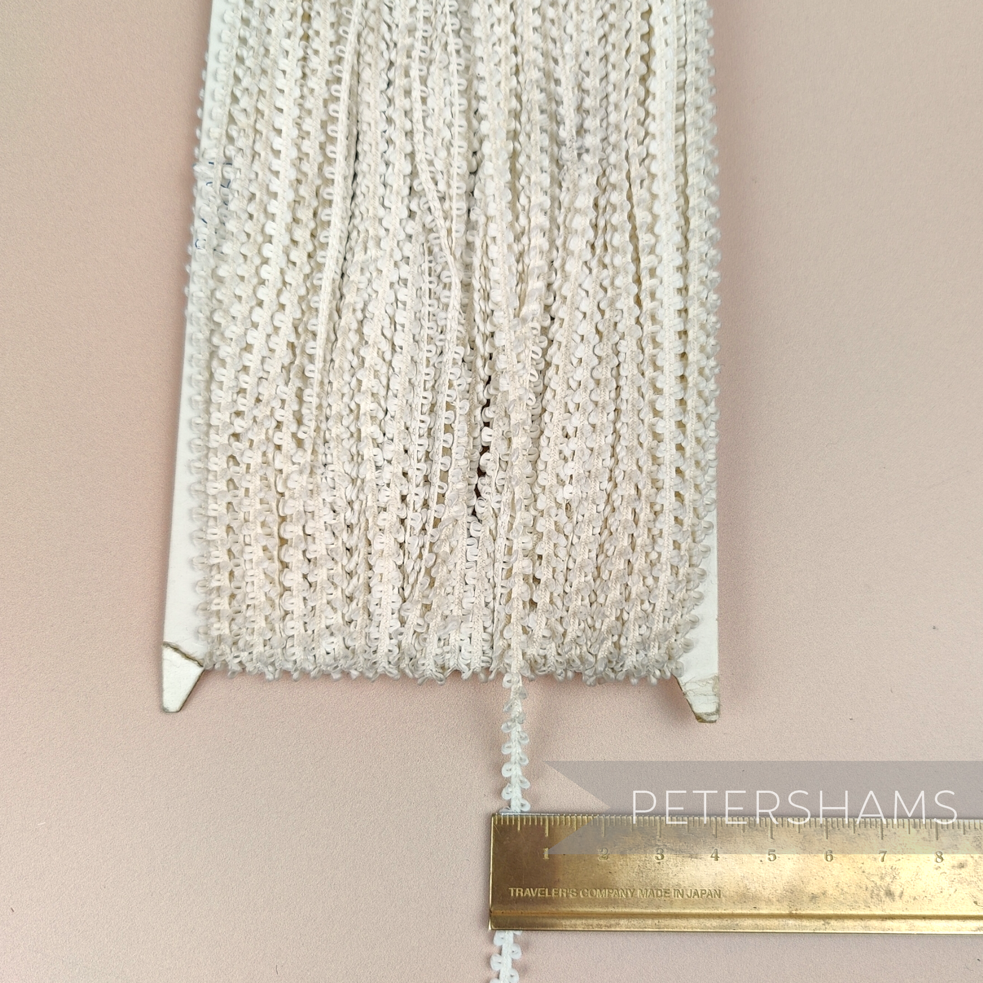 Petershams Millinery Supplies vintage ivory 5mm looped edge trim on a full card for sewing and millinery projects.