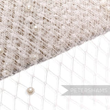 Petershams Millinery Supplies ivory diamond-patterned veiling fabric embellished with 5mm flat-backed acrylic pearls