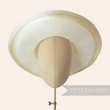 Petershams Millinery Supplies Ivory cotton threaded capeline hat body with a shiny polybraid edge