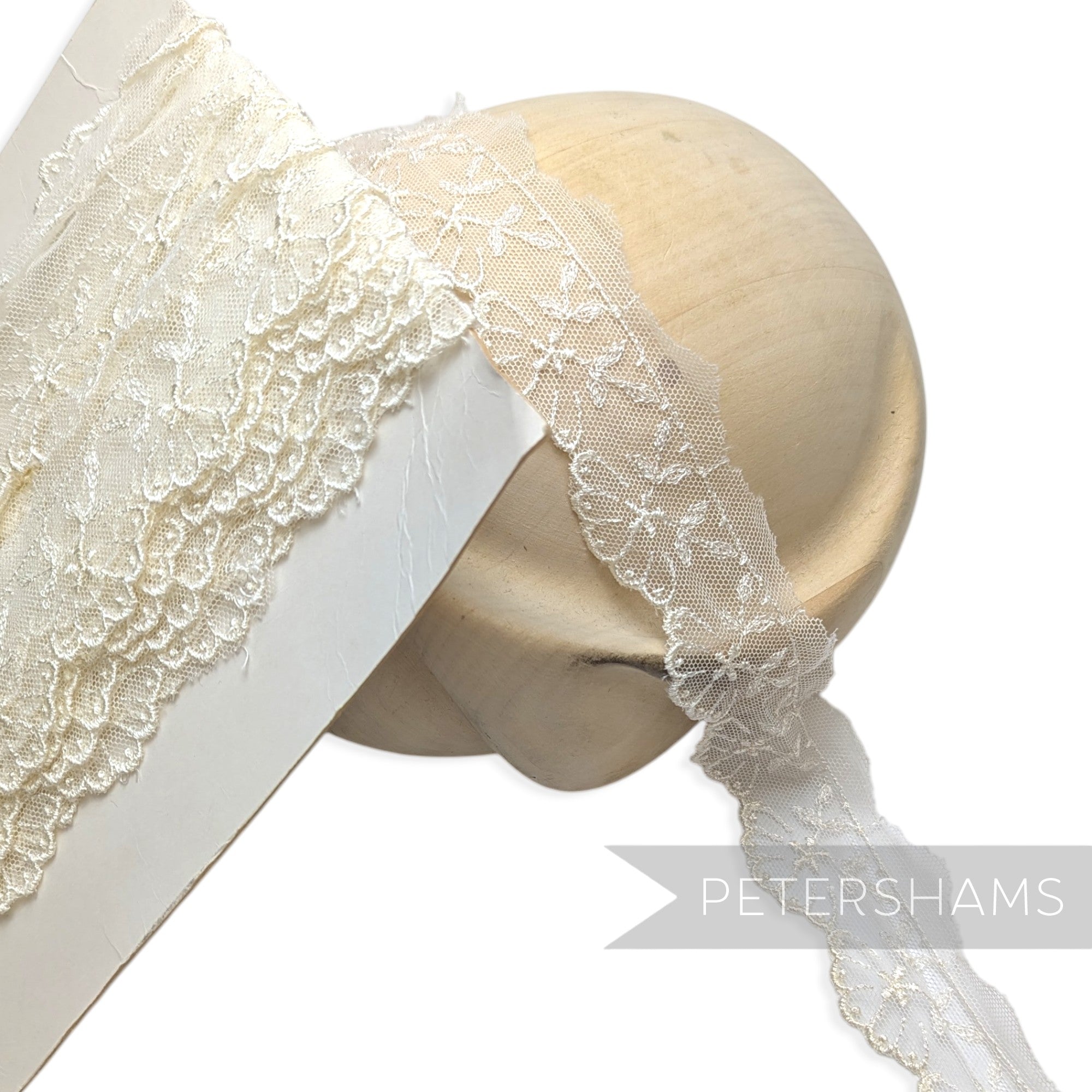 Petershams Millinery Supplies 40mm ivory embroidered tulle lace trim featuring a delicate star and leaf pattern
