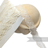 Petershams Millinery Supplies 40mm ivory embroidered tulle lace trim featuring a delicate star and leaf pattern