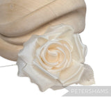 Petershams Millinery Supplies Kullie petite cream silk hat flower with curled petals and silk leaves on a wire stem.