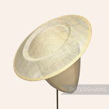 Petershams Millinery Supplies large round butter yellow sinamay fascinator hat base on a mannequin head