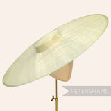 Petershams Millinery Supplies extreme cartwheel sinamay fascinator hat base in a mint green straw material.