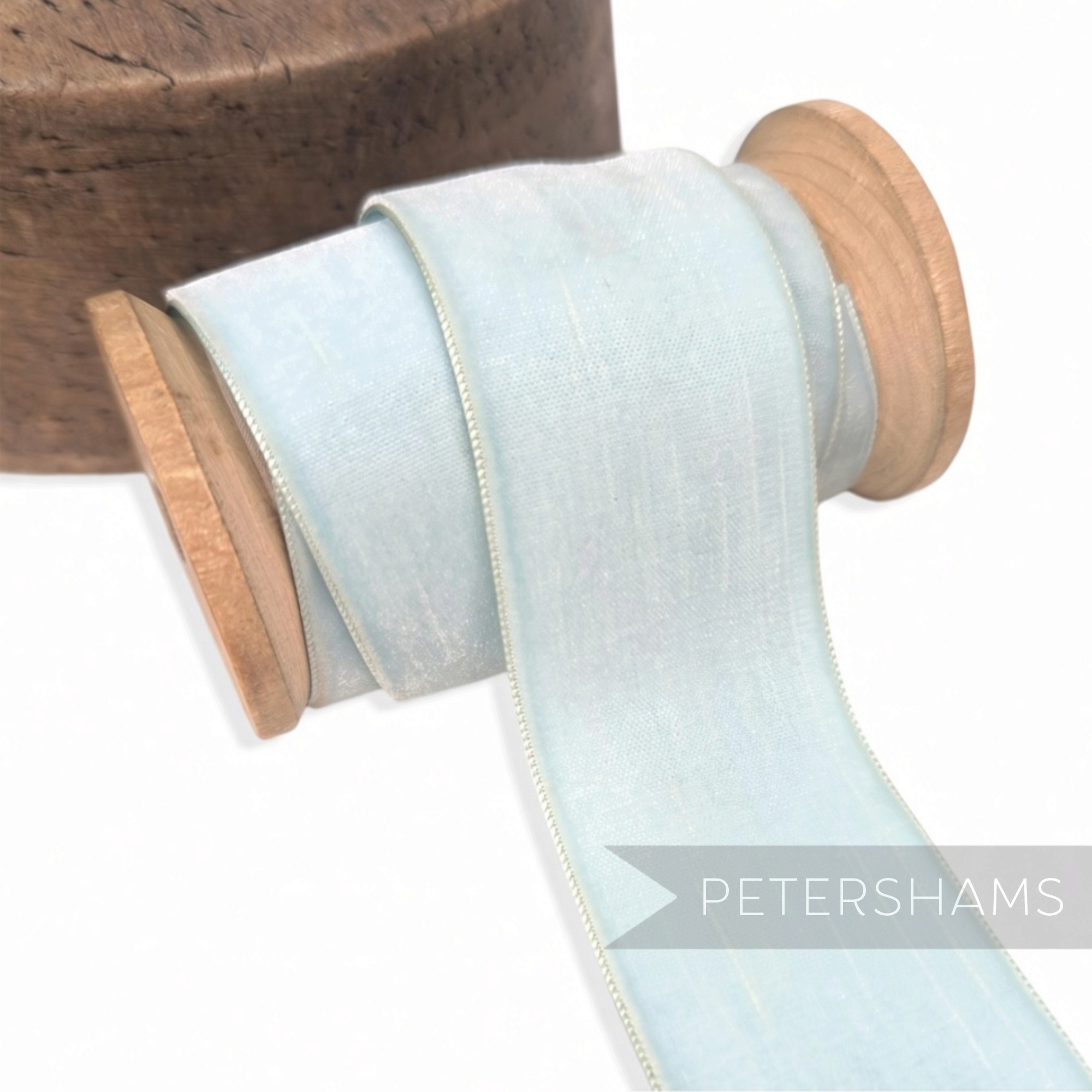 Petershams Millinery Supplies 38mm wide ice blue vintage velvet ribbon on a wooden spool for millinery projects