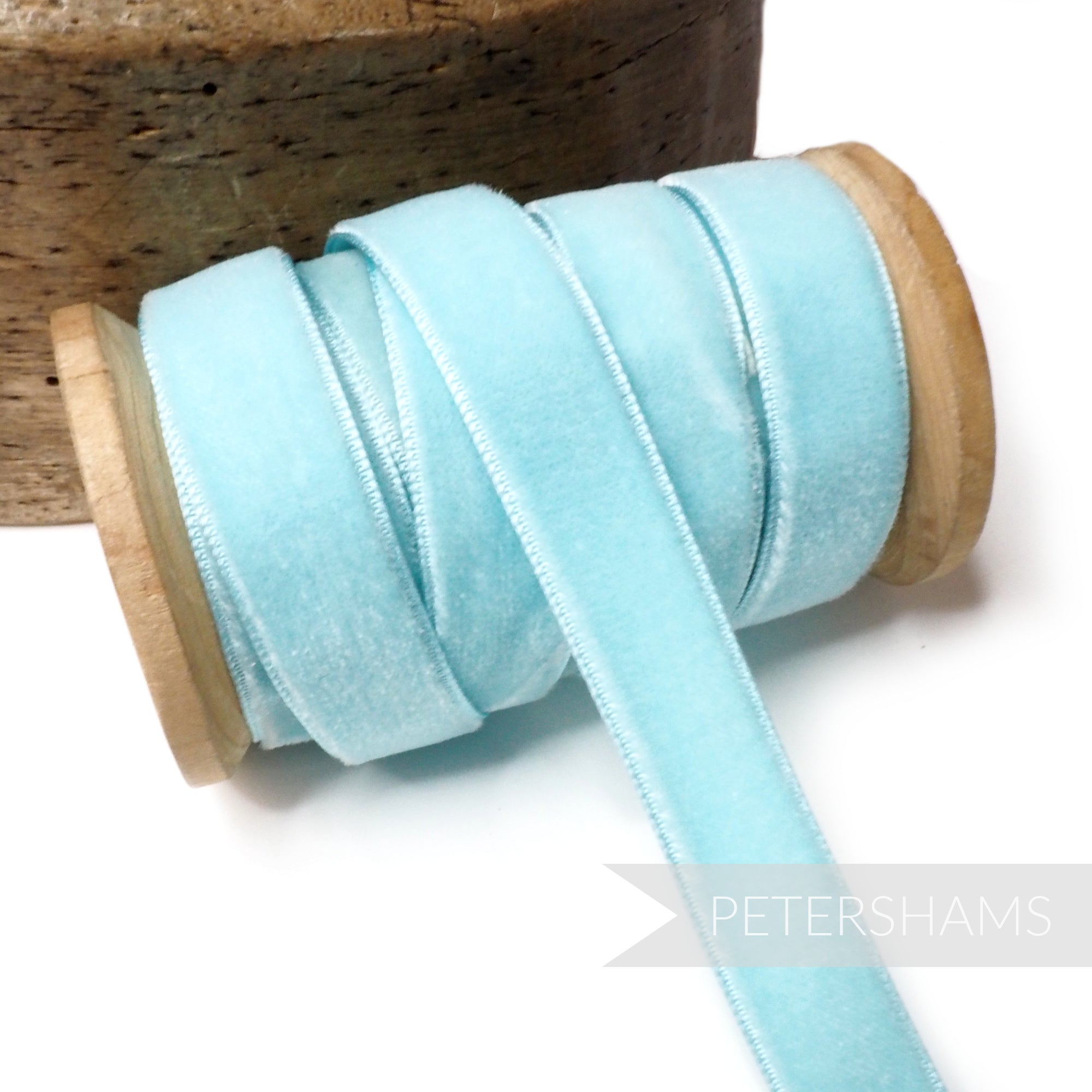 Petershams Millinery Supplies 16mm vintage light blue velvet ribbon on a wooden spool