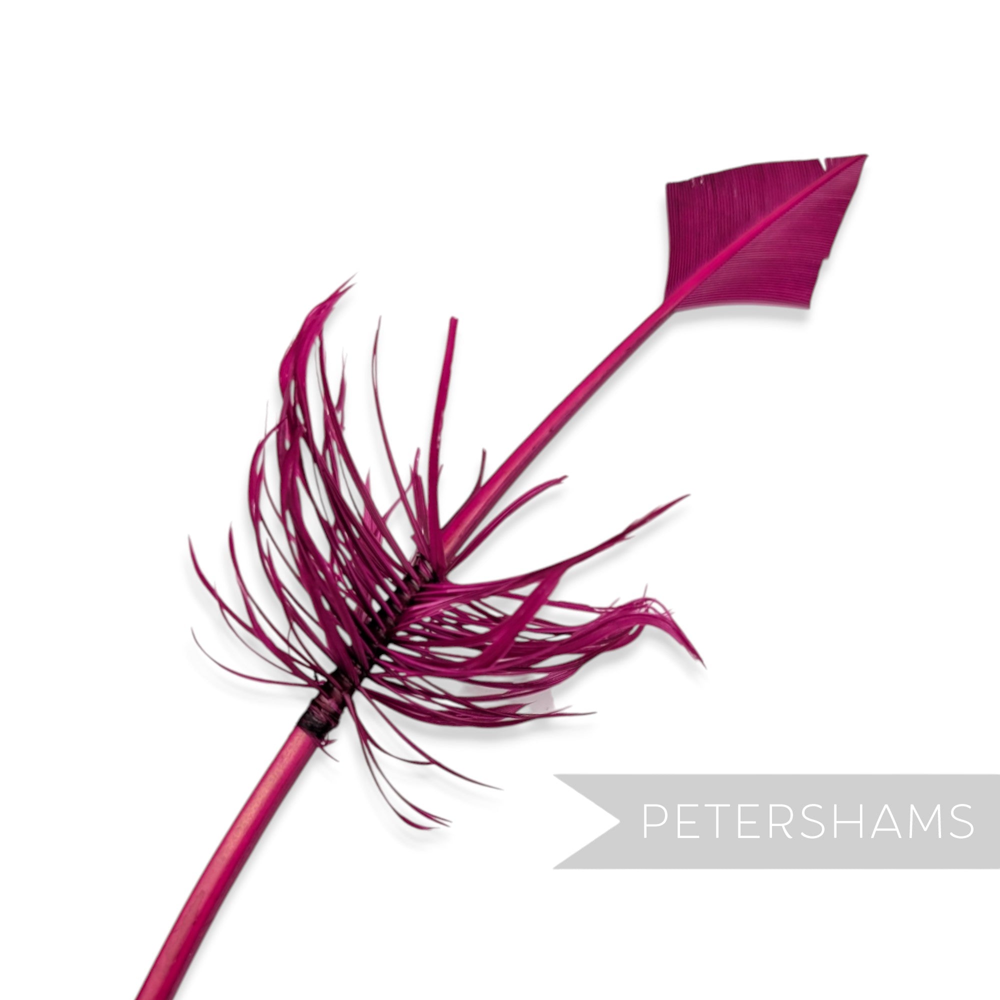 Petershams Millinery Supplies magenta turkey quill feather cut into an arrowhead shape with soft barbed accents.