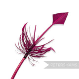 Petershams Millinery Supplies magenta turkey quill feather cut into an arrowhead shape with soft barbed accents.