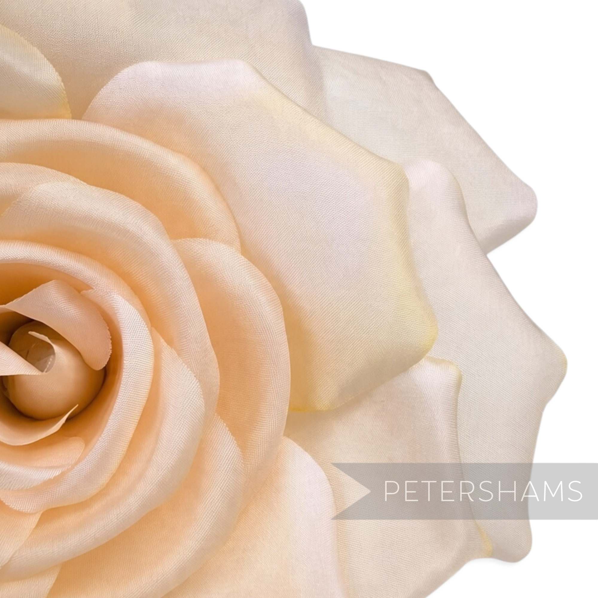 Petershams Millinery Supplies Mandy asymmetric cream fabric flower hat mount with subtle yellowed petal edges