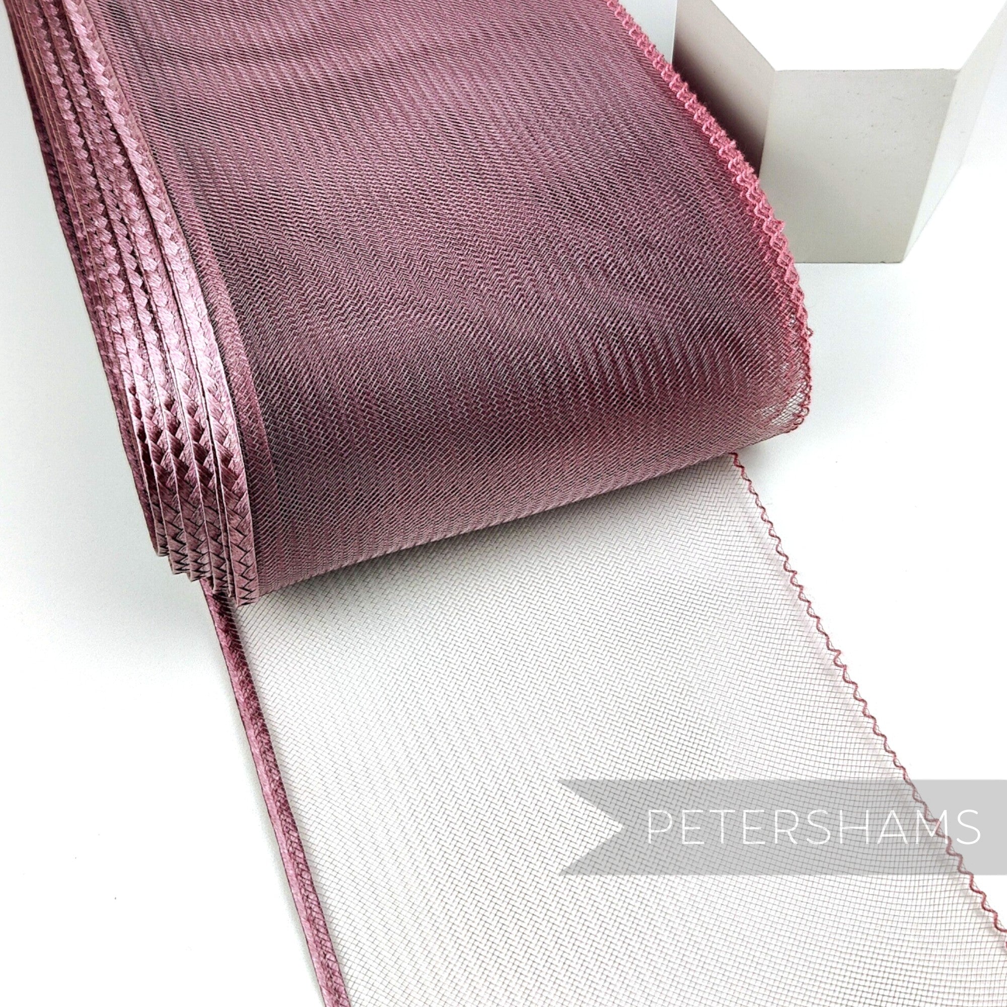 Petershams Millinery Supplies mauve 15cm wide crinoline ribbon with a shiny polybraid edge for hat making