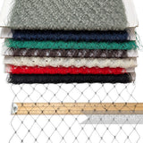 Petershams Millinery Supplies English merry widow veiling in various colors with a 3cm wide diamond pattern on a ruler.