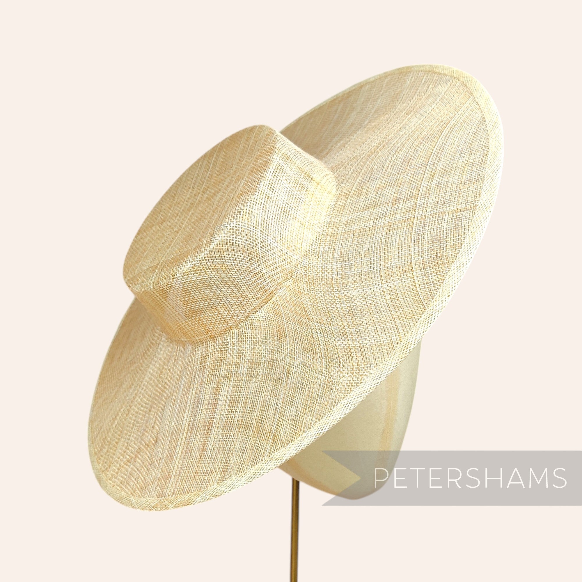 Petershams Millinery Supplies metallic lurex sinamay boater hat base in a natural straw colour with a wide brim