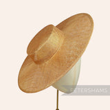 Petershams Millinery Supplies metallic lurex sinamay boater fascinator hat base in a shimmering gold finish.